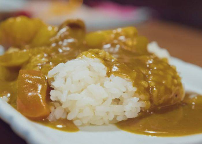 A home cooked Japanese curry at a cozy snack bar.